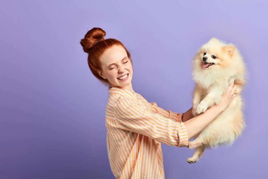 frustated women going to clean her pet