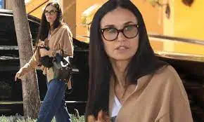Good company: Demi Moore and her dog Pilaf stepped out on a shopping trip in Santa Monica on Friday afternoon
